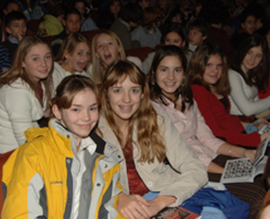 Children in theater seats