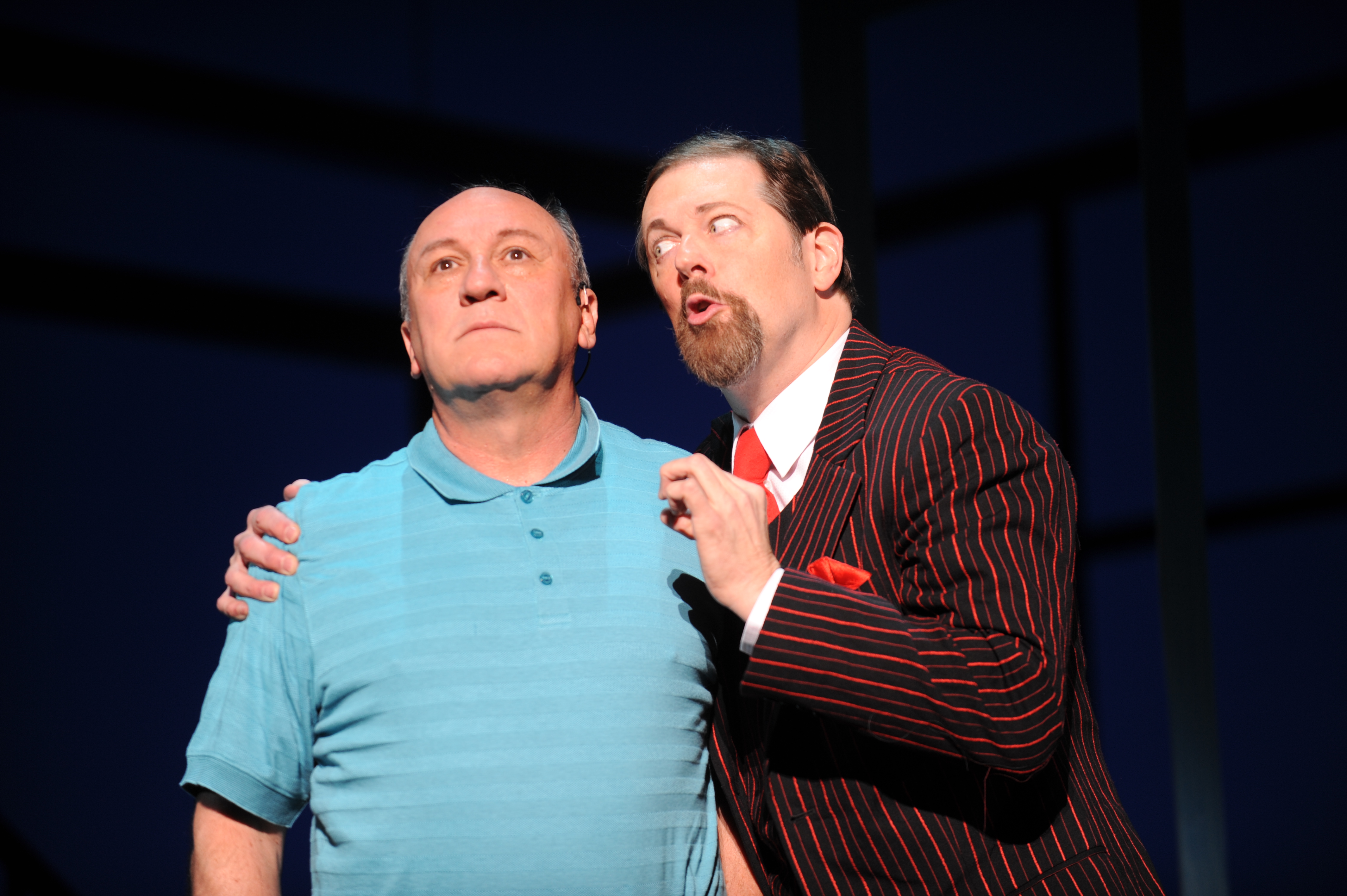 Jeffrey Howell as Joe Boyd and John Bolton as Applegate in 'Damn Yankees' playing through July 10 at the Benedum Center.